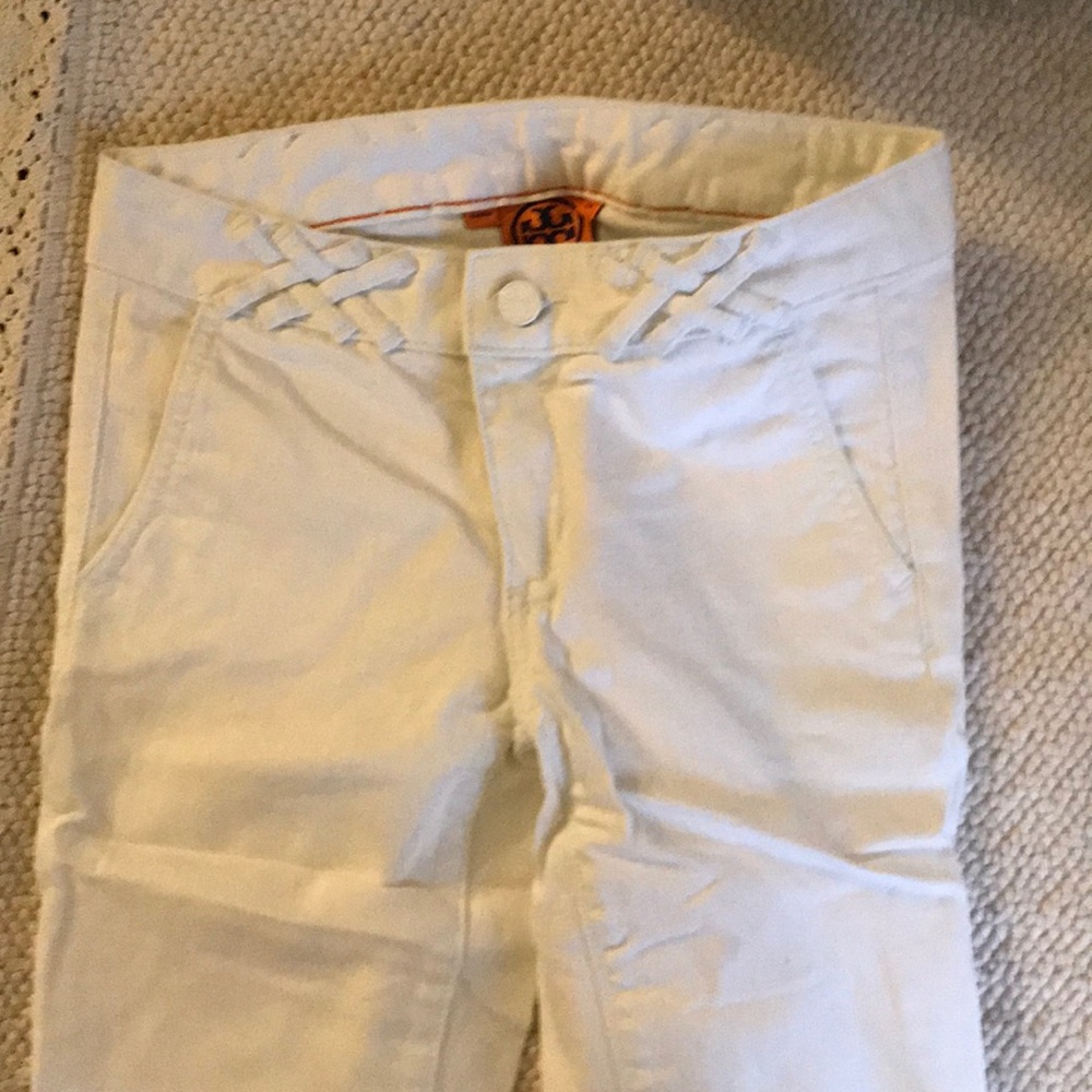 Tory Burch white jeans.